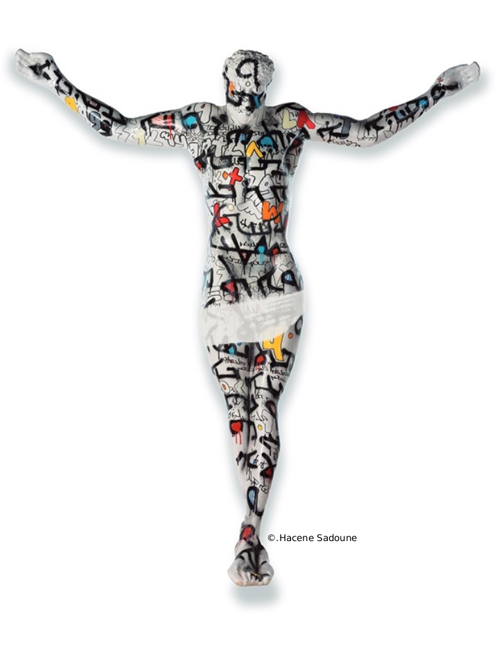 Jesustreet. Sculpture de jésus christ taggé par Kongo, texte en Araméen de la déclaration des droit de l'humain